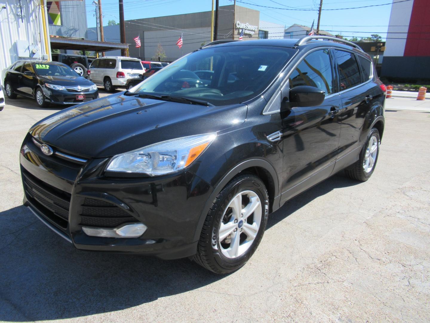 2014 Black /Black Ford Escape SE 4WD (1FMCU9GX5EU) with an 1.6L L4 DOHC 16V engine, Automatic transmission, located at 1511 North Shepherd Dr., Houston, TX, 77008, (281) 657-1221, 29.798361, -95.412560 - 2014 FORD ESCAPE SE VIN: 1FMCU9GX5EUC37295 1 F M C U 9 G X 5 E U C 3 7 2 9 5 4 DOOR WAGON/SPORT UTILITY 1.6L I4 F DOHC 16V GASOLINE FRONT WHEEL DRIVE W/ 4X4 - Photo#19